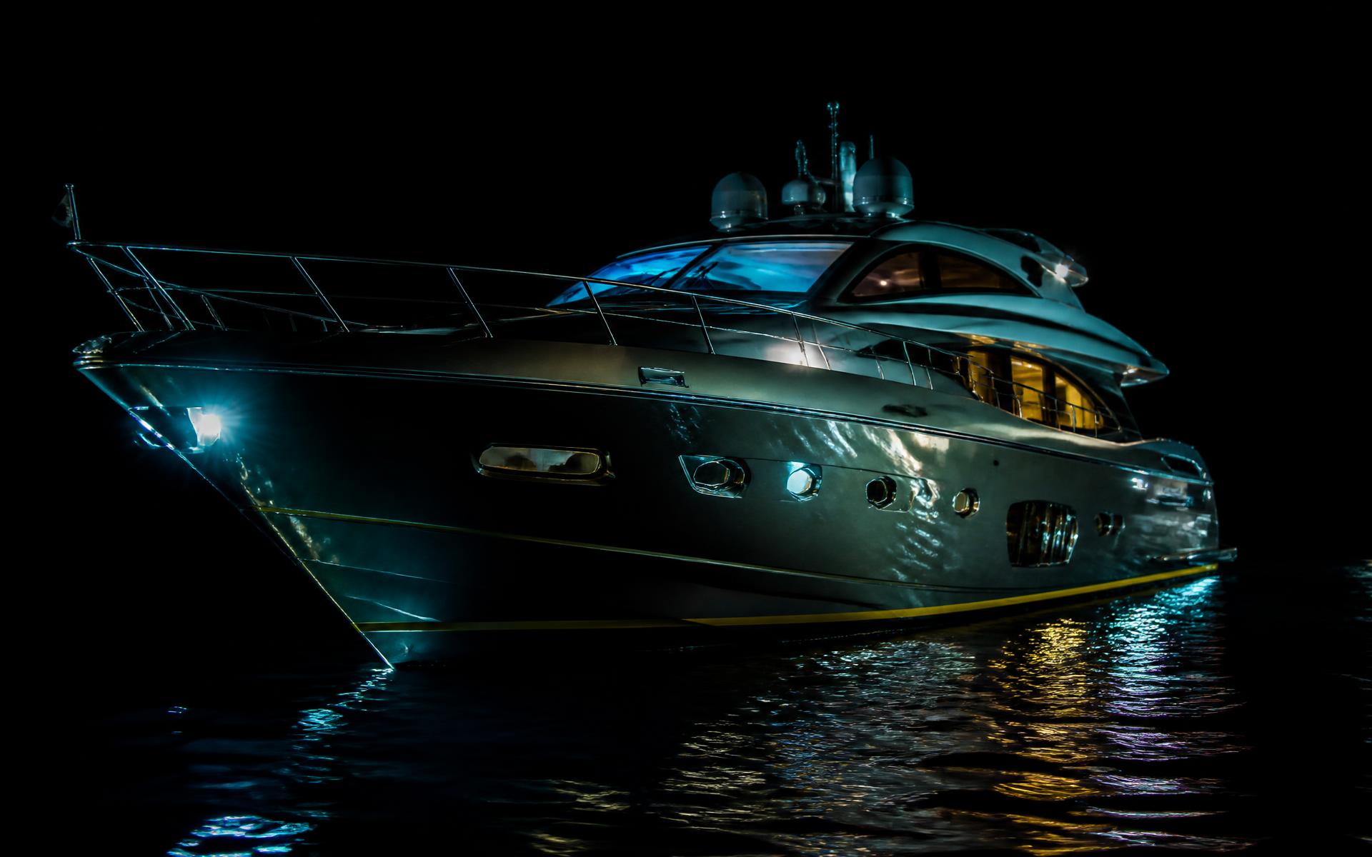 Boat at night with a freshly painted glossy hull